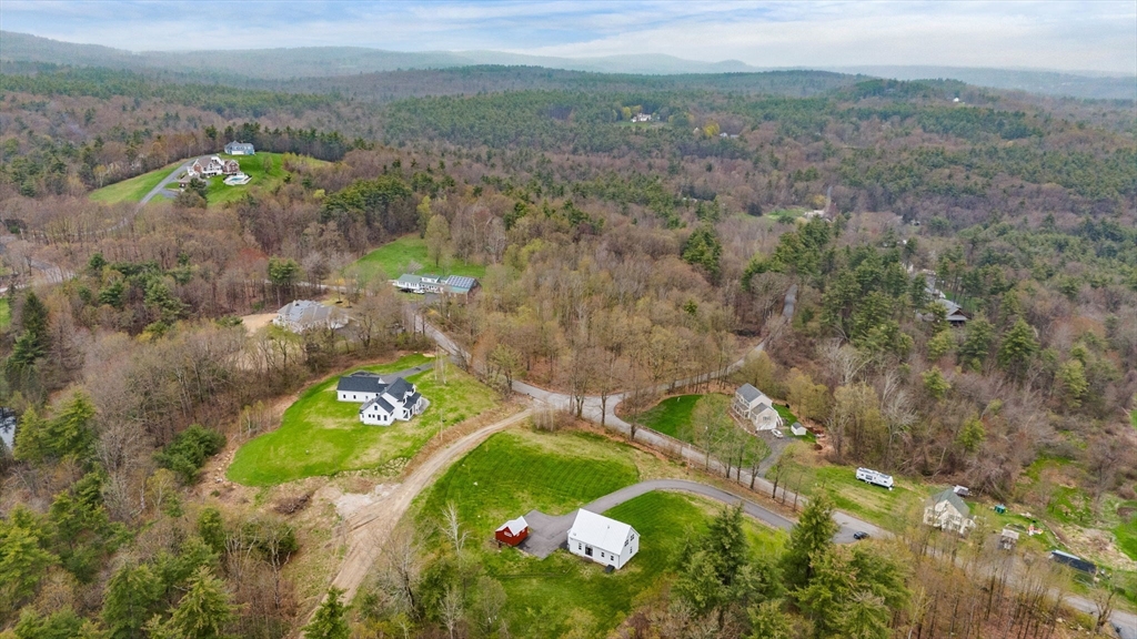 29 Heywood Road Ashby, MA 01431 - Photo 2 of 33 a view of a lake with green space