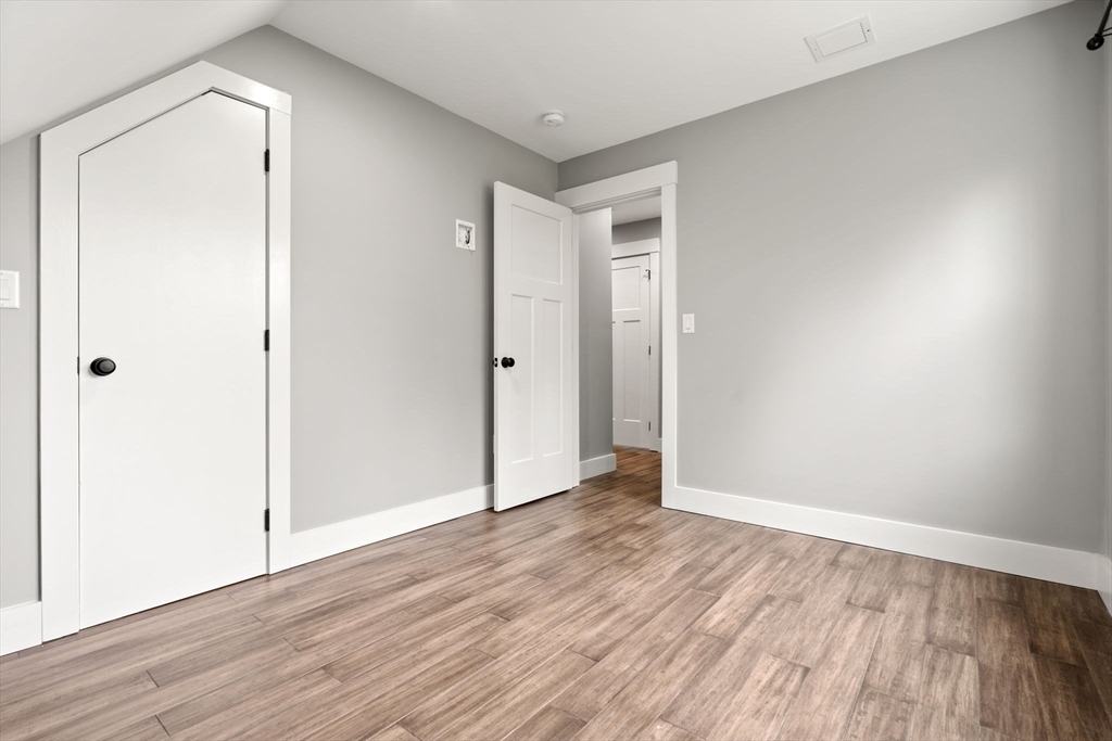 29 Heywood Road Ashby, MA 01431 - Photo 26 of 33 a view of an empty room and wooden floor