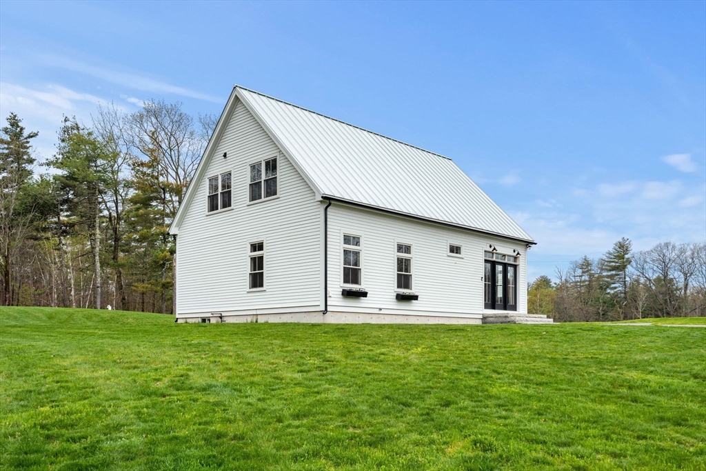 29 Heywood Road Ashby, MA 01431 - Photo 29 of 33 a front view of house with yard