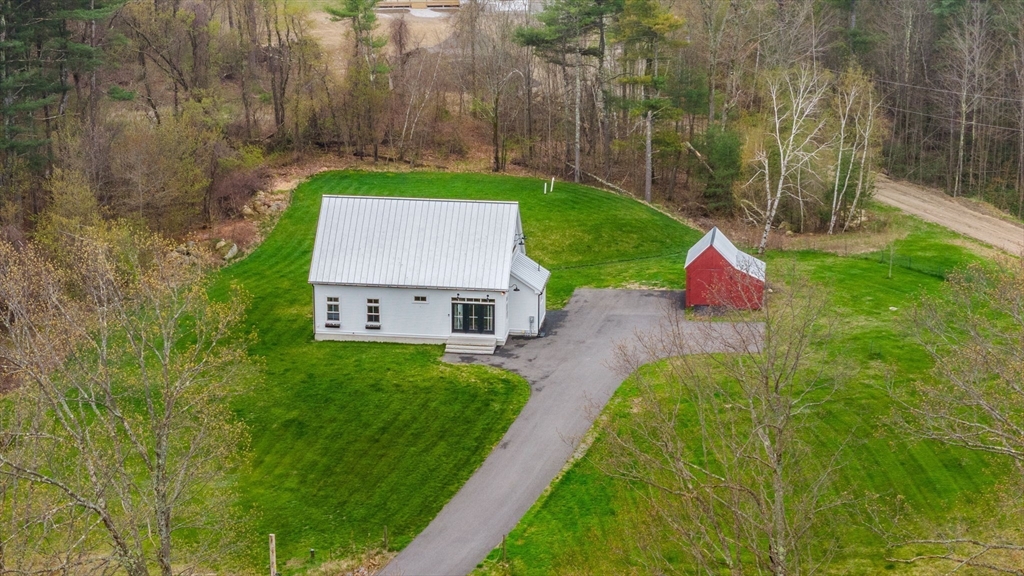 29 Heywood Road Ashby, MA 01431 - Photo 33 of 33 a view of a backyard with garden