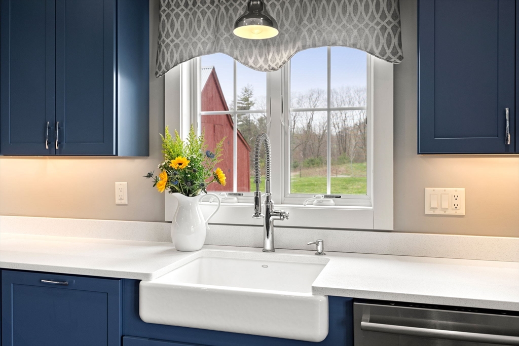 29 Heywood Road Ashby, MA 01431 - Photo 7 of 33 a bathroom with a sink and a mirror