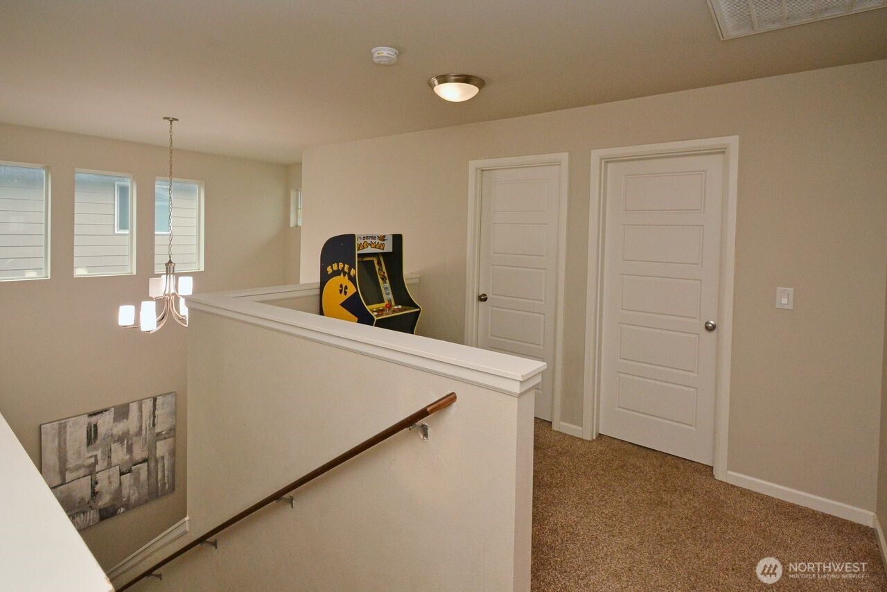 9976 Charles Street Southeast Yelm, WA 98597 - Photo 11 of 30 a view of a storage & utility room with two washing machine