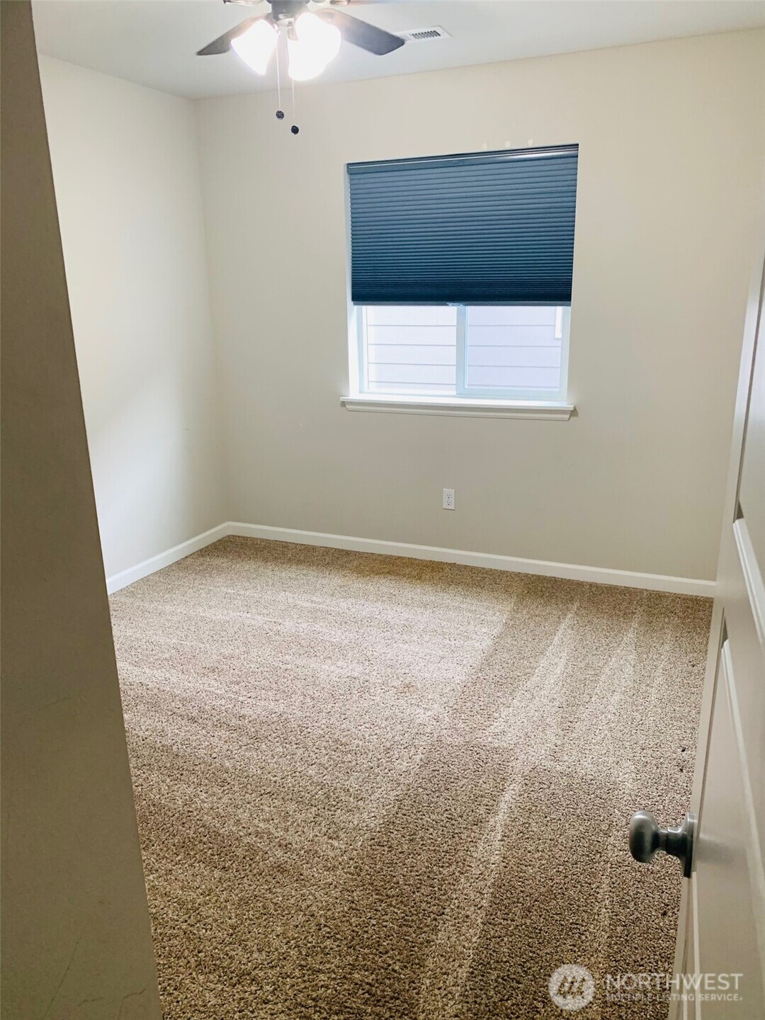 9976 Charles Street Southeast Yelm, WA 98597 - Photo 13 of 30 a bathroom with a window
