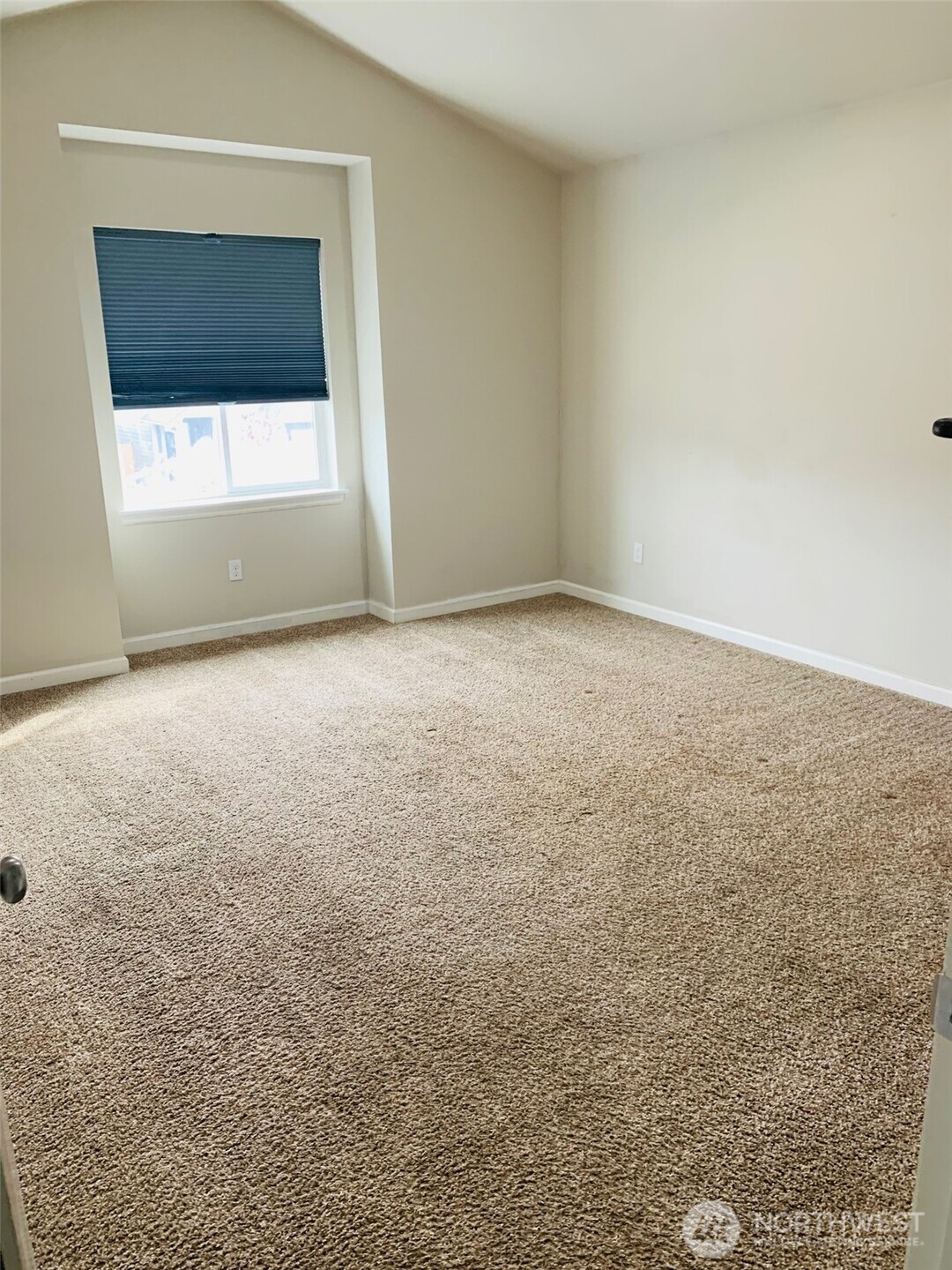 9976 Charles Street Southeast Yelm, WA 98597 - Photo 16 of 30 a view of an empty room with a kitchen