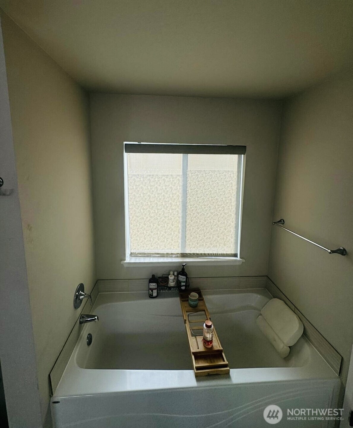 9976 Charles Street Southeast Yelm, WA 98597 - Photo 18 of 30 a bath tub sitting in a bathroom next to a window