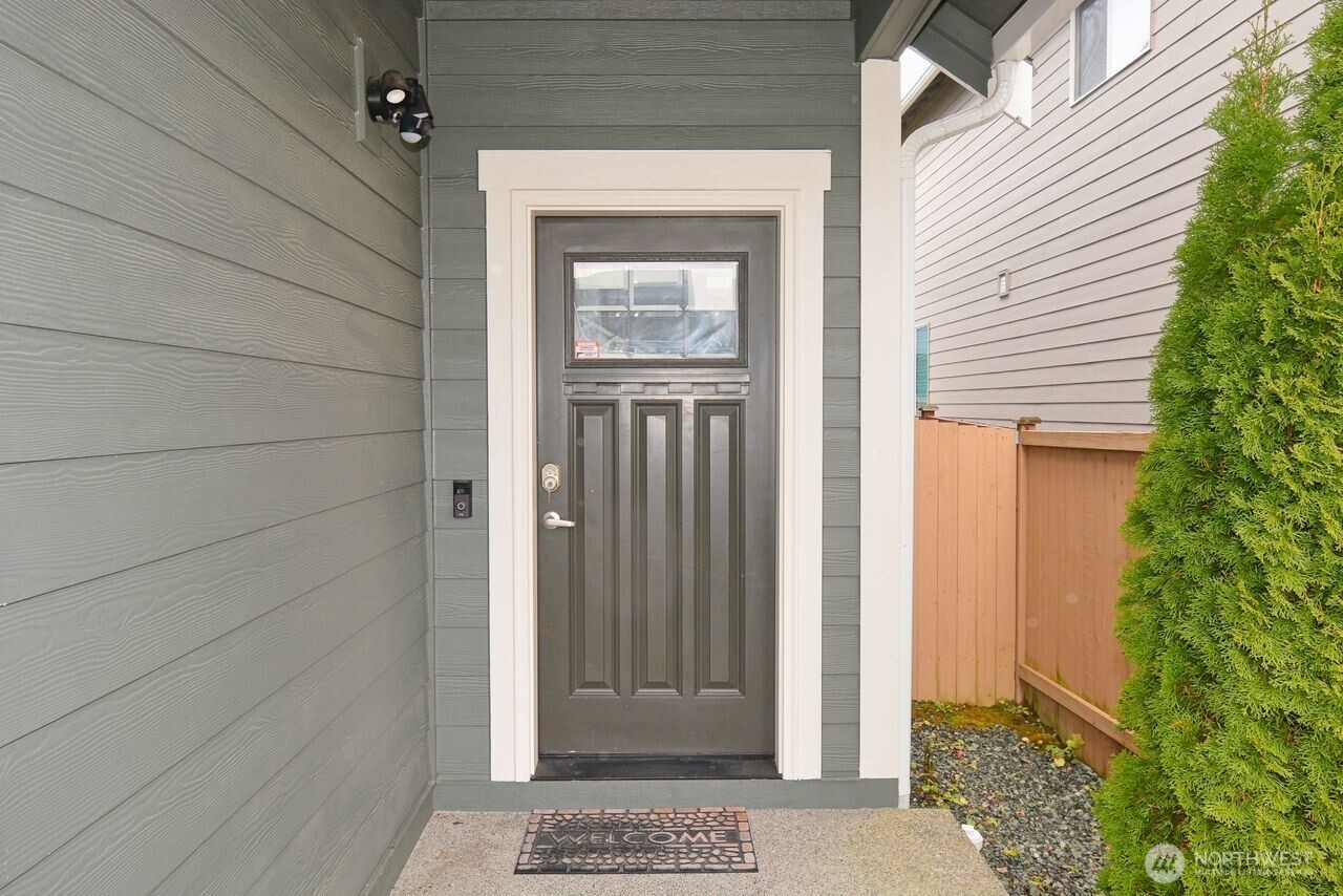 9976 Charles Street Southeast Yelm, WA 98597 - Photo 2 of 30 a view of a wooden door