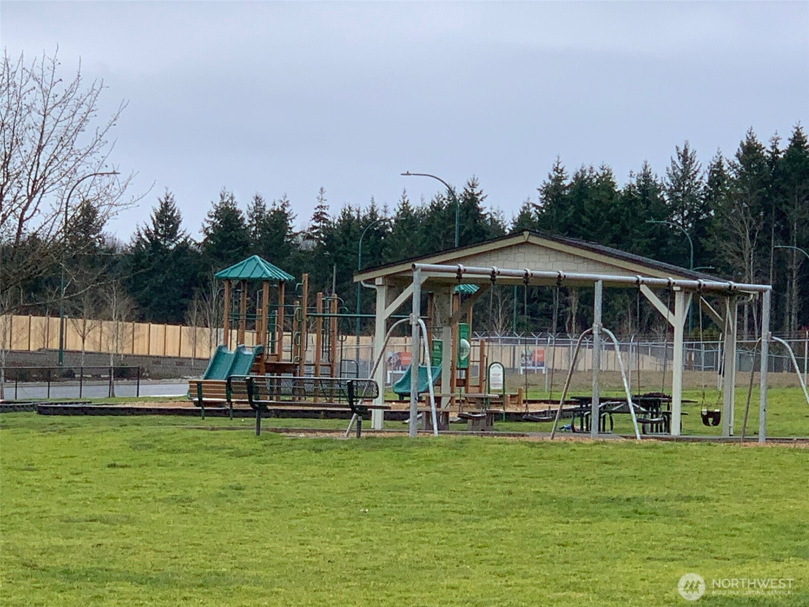 9976 Charles Street Southeast Yelm, WA 98597 - Photo 30 of 30 a view of a chair and table in the garden