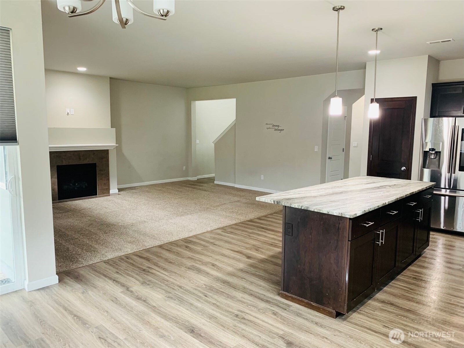 9976 Charles Street Southeast Yelm, WA 98597 - Photo 8 of 30 a kitchen with a stove and a sink