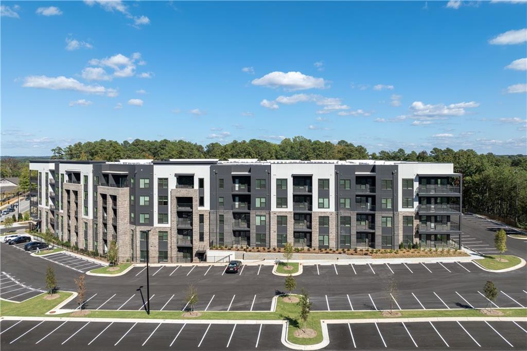 3108 McGinnis Ferry Road, Unit A6 Suwanee, GA 30024 - Photo 15 of 17 a view of a balcony with a patio