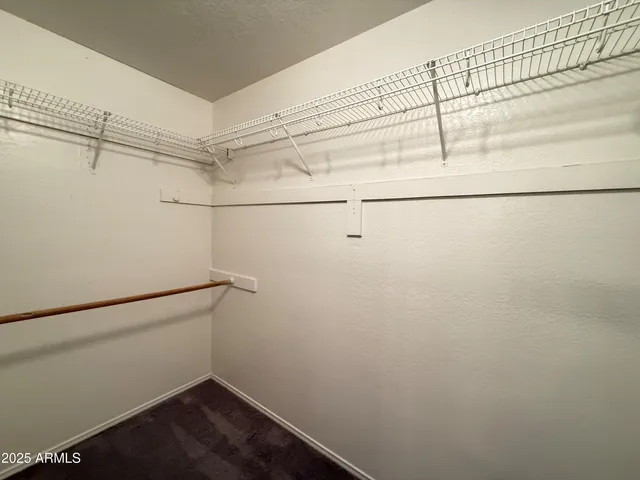 a view of a room with racks on the wall