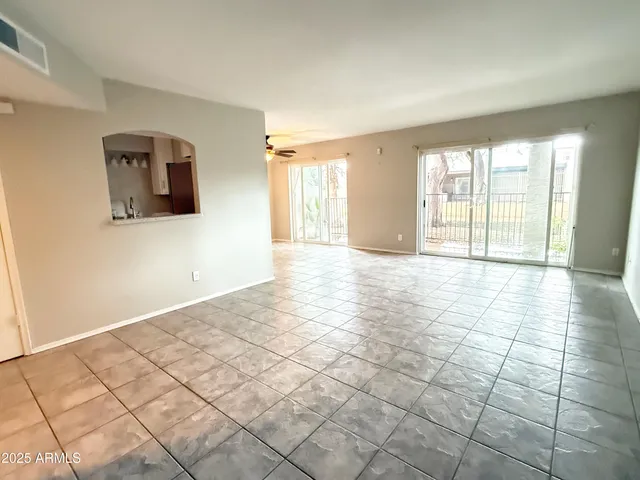 a view of an empty room and window