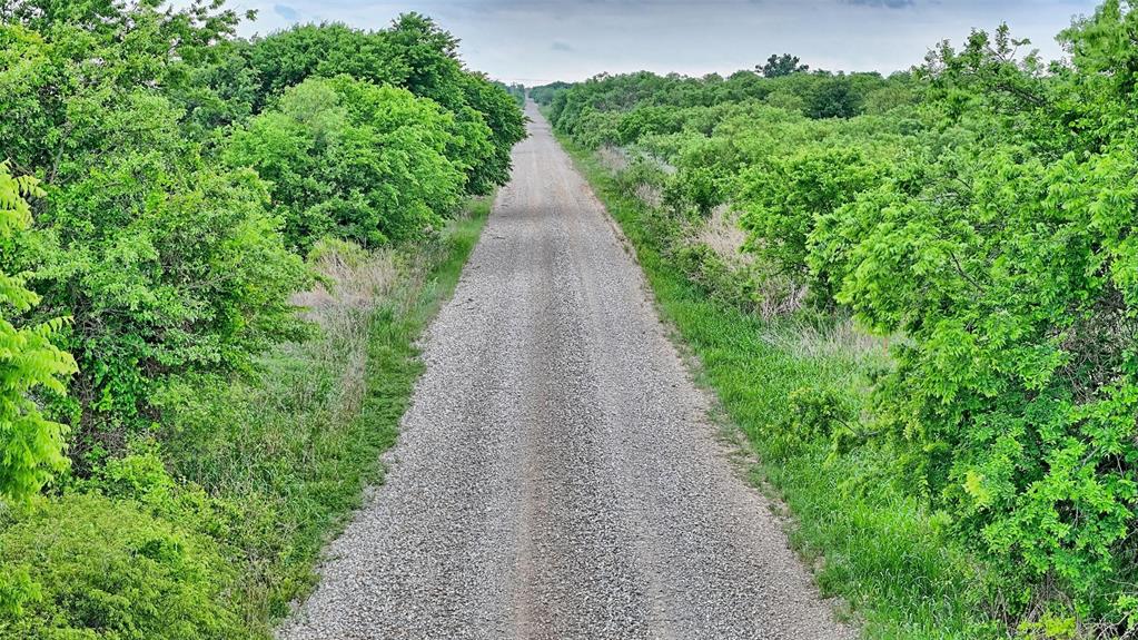 0 Watson Road Windthorst, TX 76389 - Photo 8 of 27 a view of a pathway with a garden