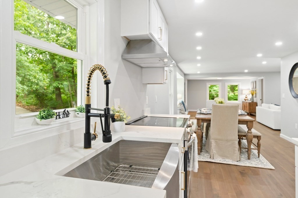 16 Chamberlain Road Shrewsbury, MA 01545 - Photo 15 of 38 a view of a dining room with furniture window and wooden floor