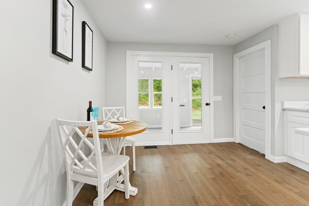 16 Chamberlain Road Shrewsbury, MA 01545 - Photo 16 of 38 a view of a dining room with furniture and wooden floor