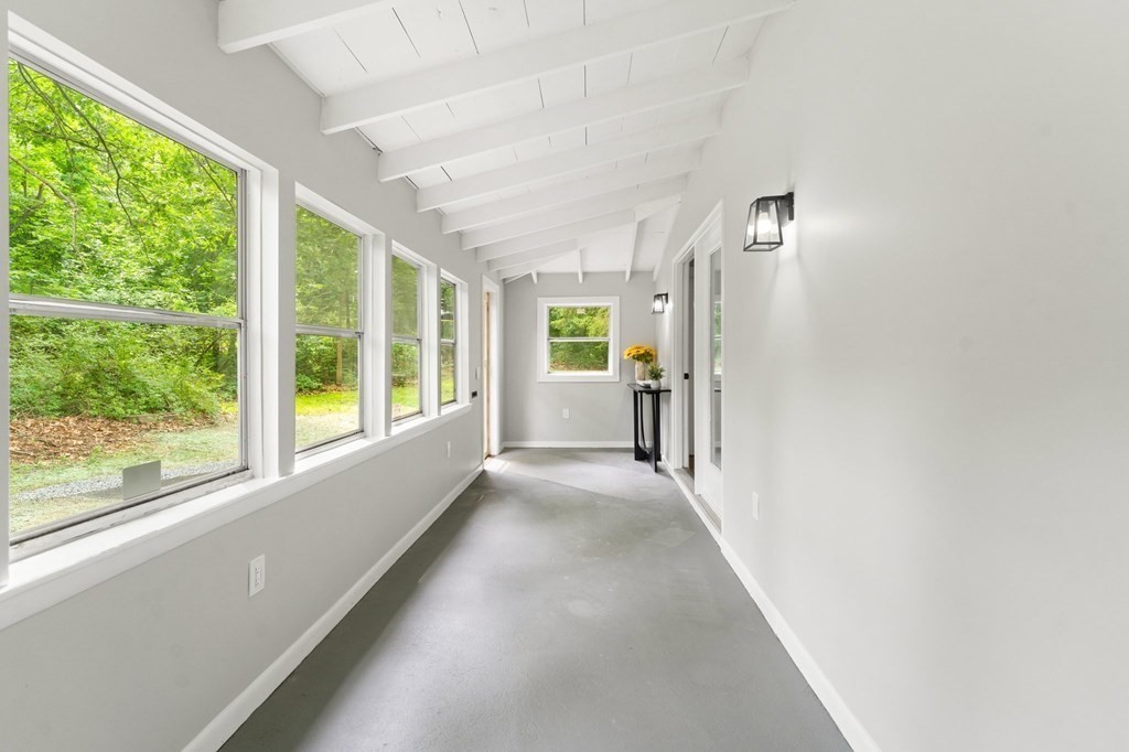 16 Chamberlain Road Shrewsbury, MA 01545 - Photo 18 of 38 a view of a hallway with windows