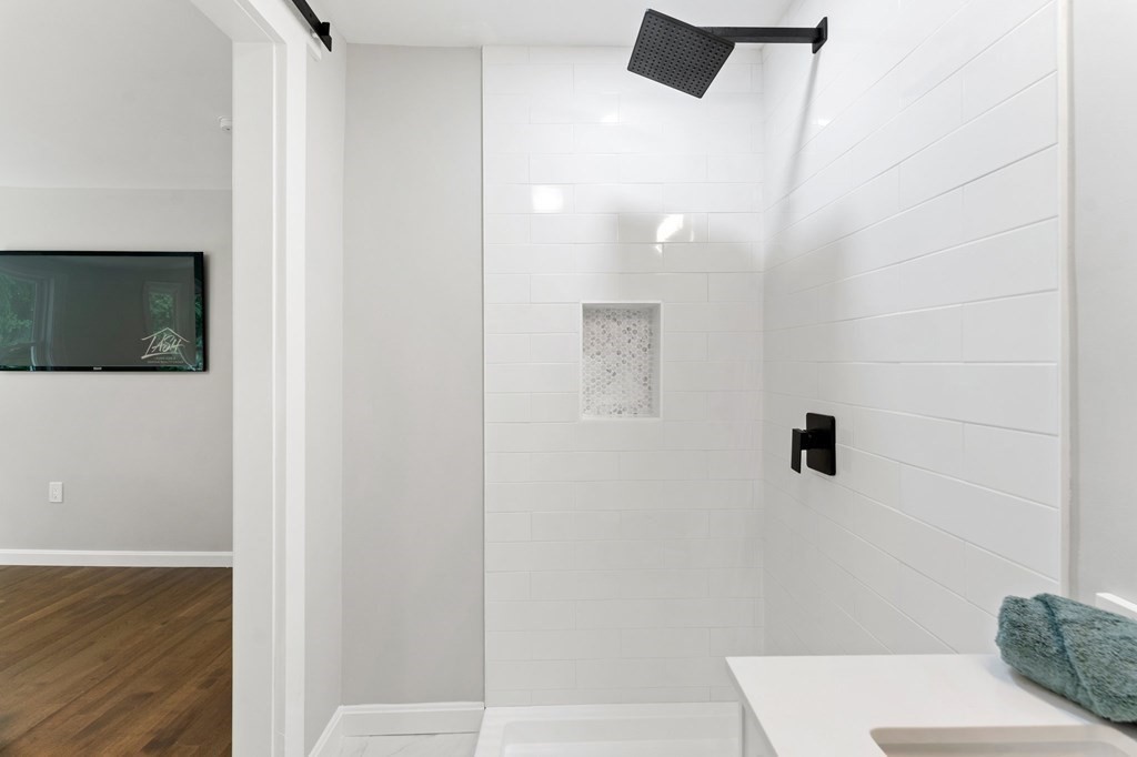 16 Chamberlain Road Shrewsbury, MA 01545 - Photo 25 of 38 a bathroom with a shower