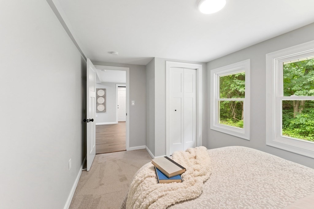 16 Chamberlain Road Shrewsbury, MA 01545 - Photo 27 of 38 a bedroom with a bed and a window