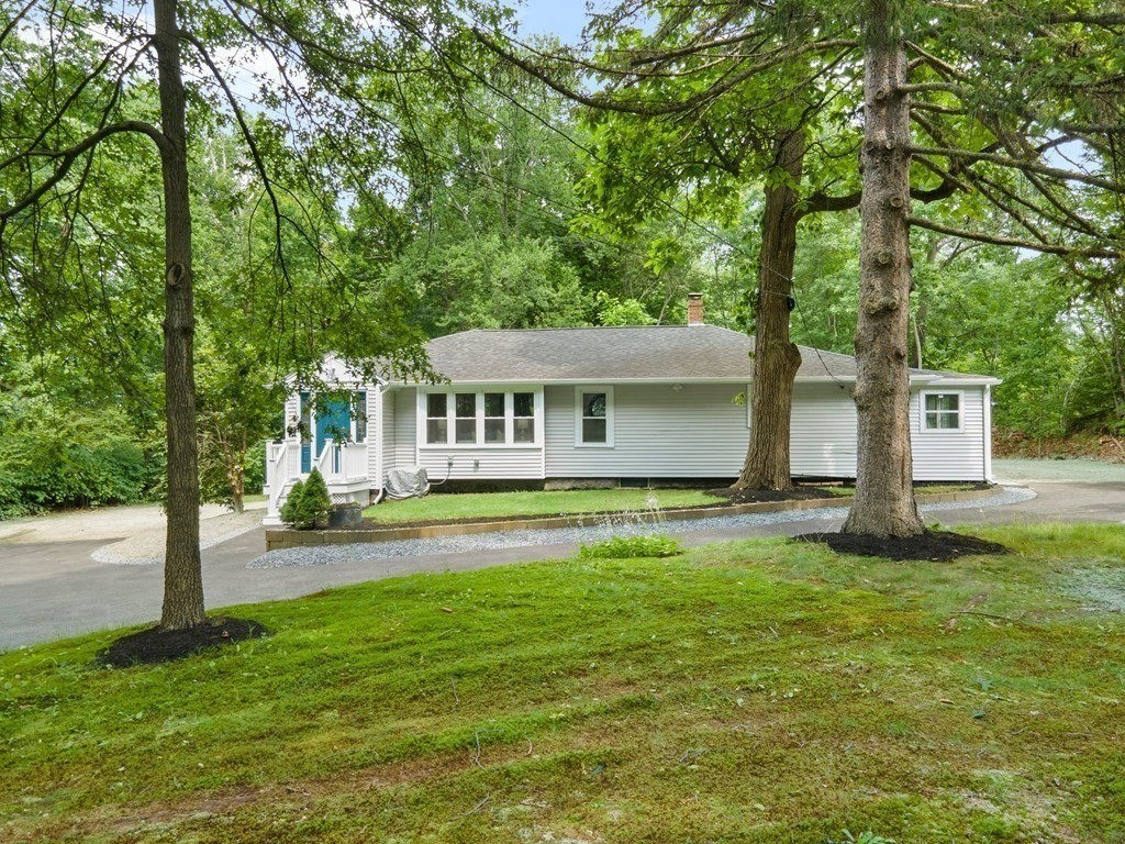16 Chamberlain Road Shrewsbury, MA 01545 - Photo 33 of 38 a view of a house with a yard and a tree