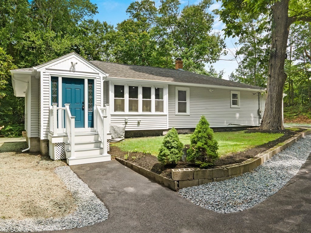 16 Chamberlain Road Shrewsbury, MA 01545 - Photo 36 of 38 front view of a house with a yard