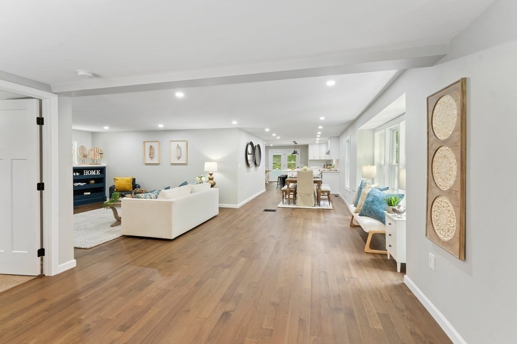 16 Chamberlain Road Shrewsbury, MA 01545 - Photo 6 of 38 a living room with furniture and a wooden floor