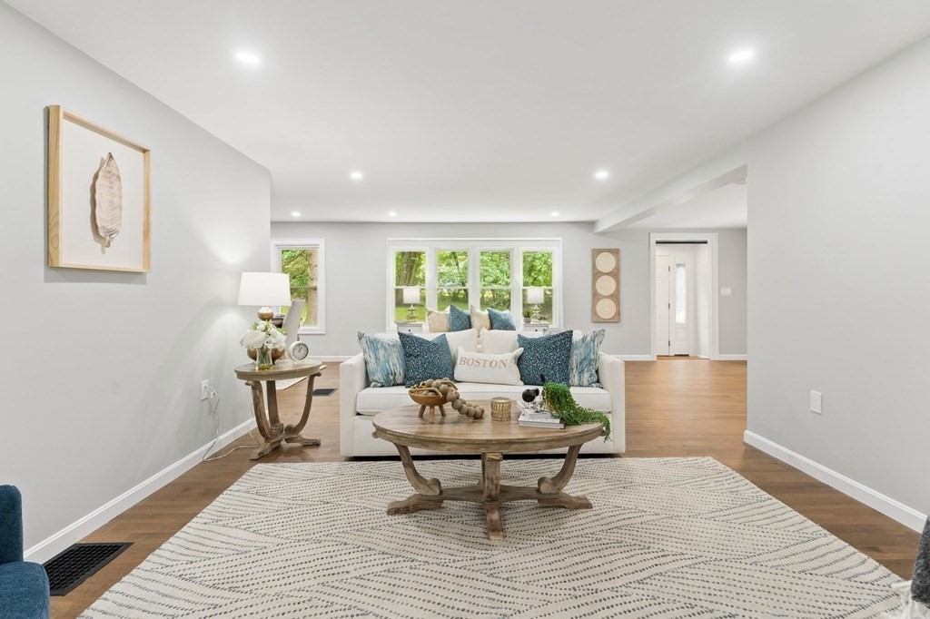 16 Chamberlain Road Shrewsbury, MA 01545 - Photo 9 of 38 a living room with furniture and a window