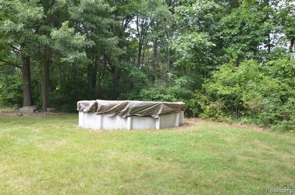 8620 Eaton Road Davisburg, MI 48350 - Photo 39 of 55 POOL AREA - ROOM FOR AN IN GROUND
