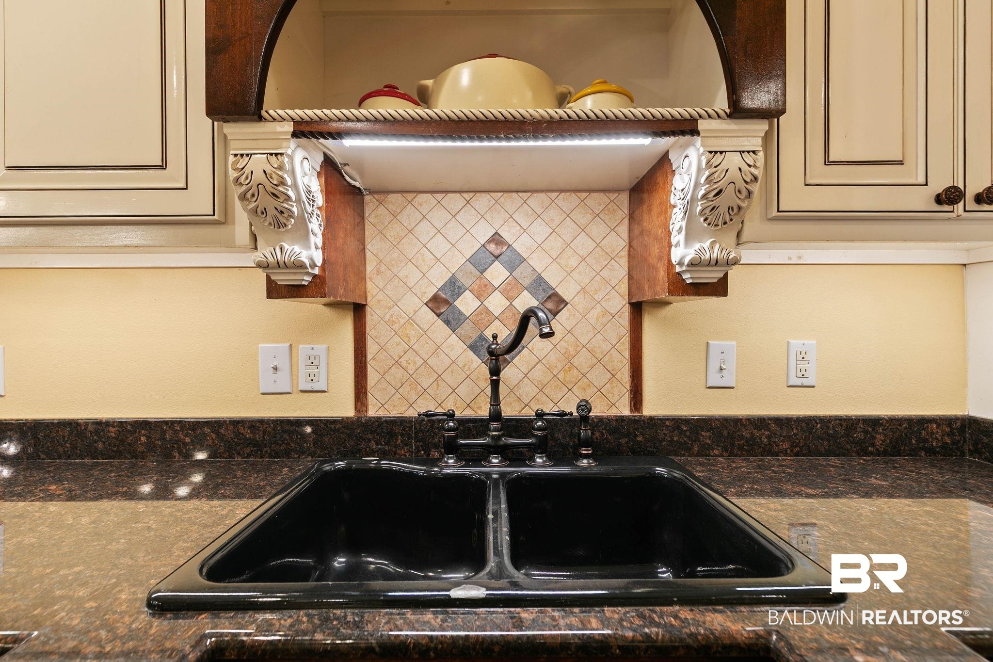 3668 Claridge Road North Mobile, AL 36608 - Photo 42 of 100 Kitchen featuring a sink and dark stone countertops