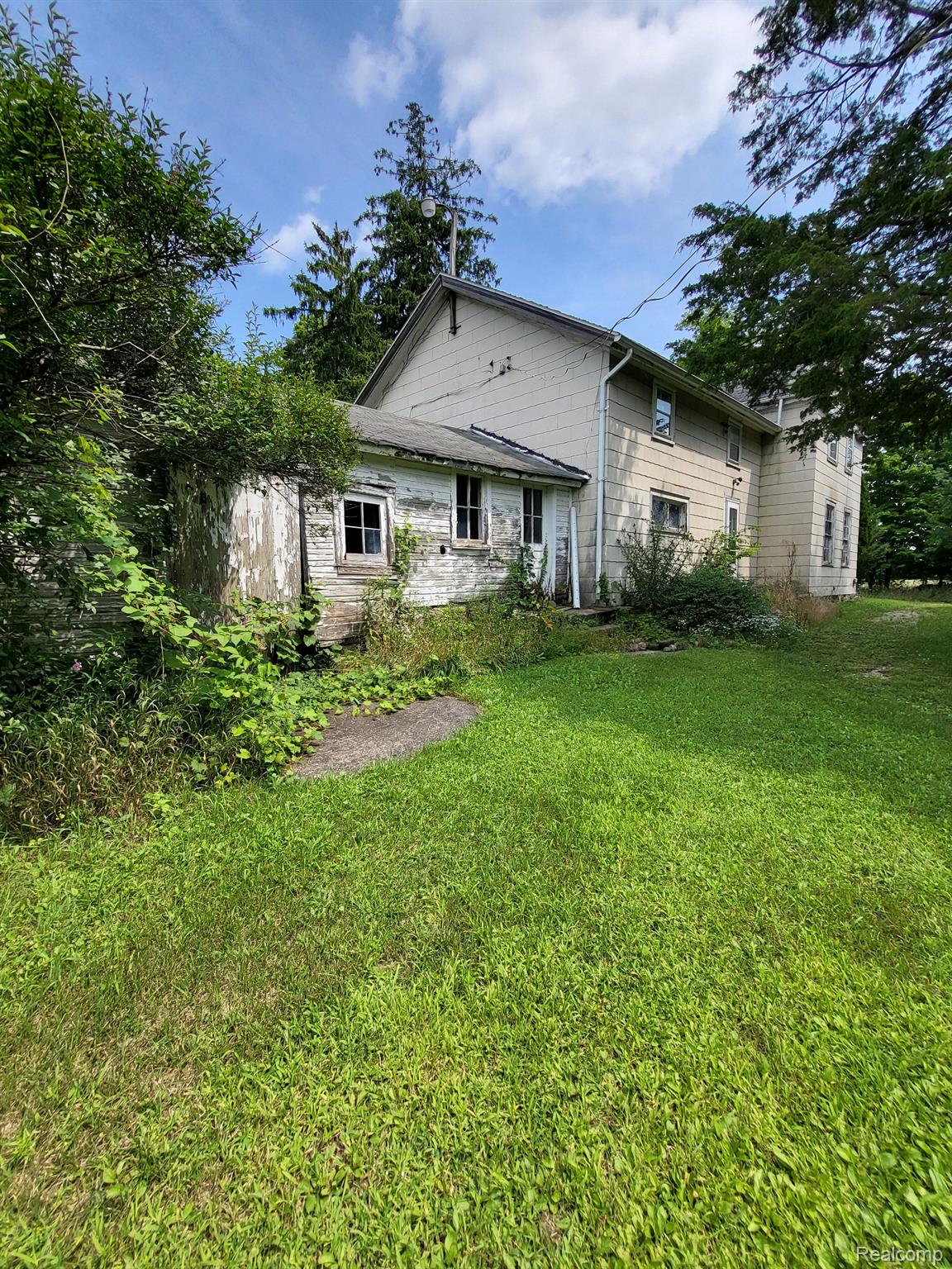 4865 North Eager Road Howell, MI 48855 - Photo 11 of 66 South side of house back addition not heated