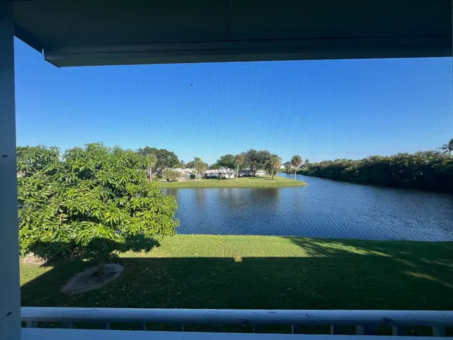 a view of a lake with outdoor space