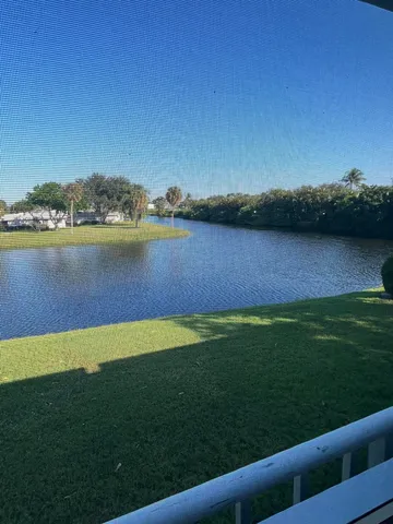 a view of a lake from a yard