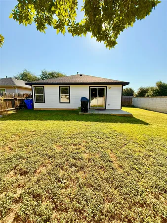 a view of an ocean with a mountain