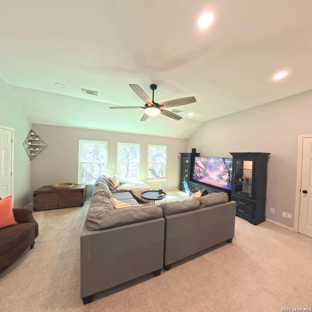 20115 Standish Road San Antonio, TX 78258 - Photo 30 of 51 a living room with furniture and a large window