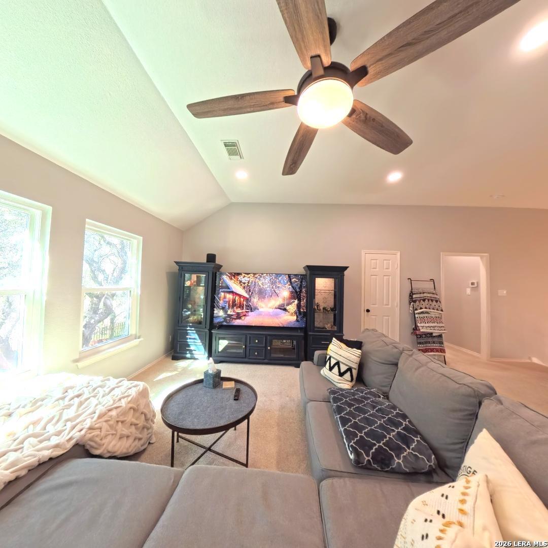 20115 Standish Road San Antonio, TX 78258 - Photo 31 of 51 a living room with furniture and a large window