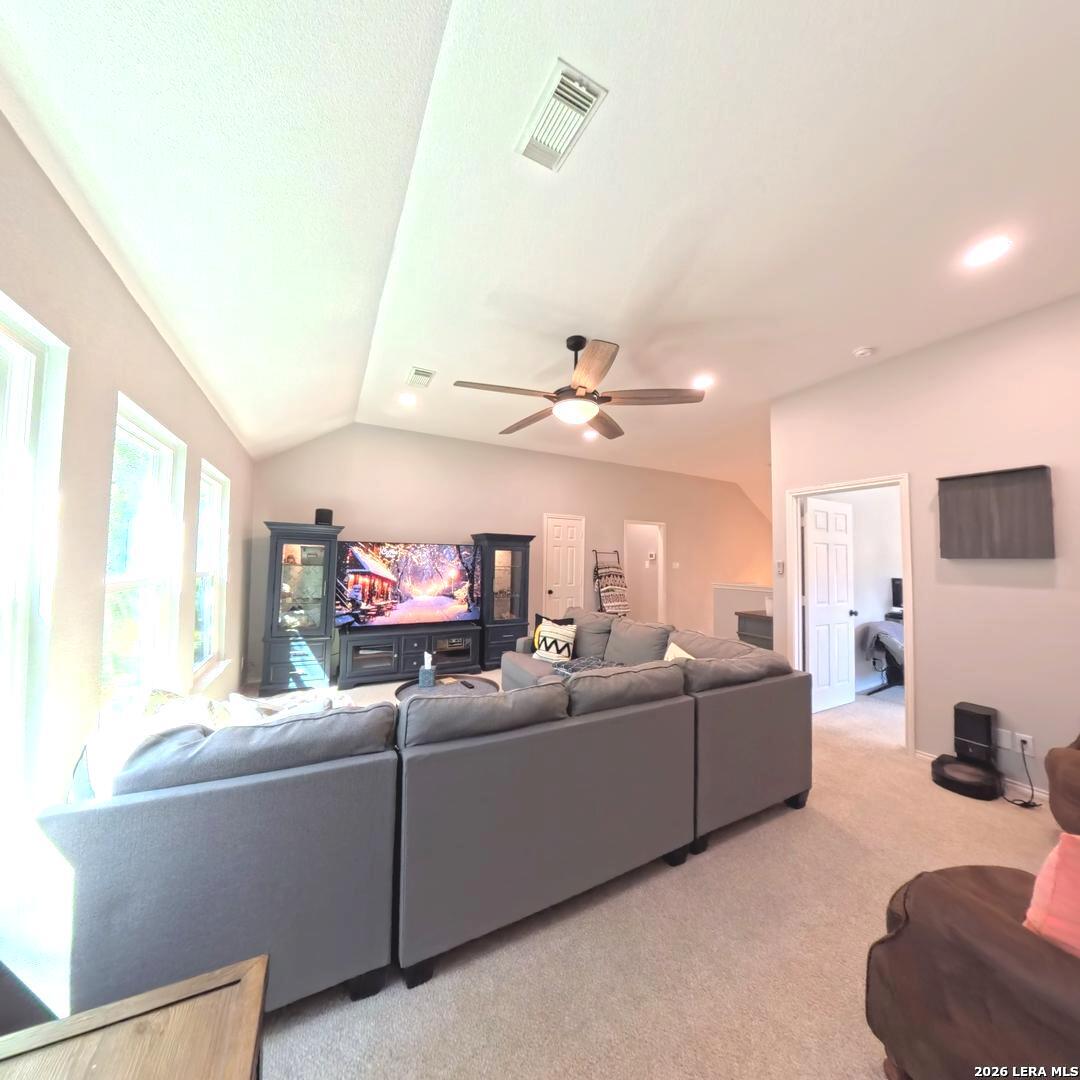 20115 Standish Road San Antonio, TX 78258 - Photo 32 of 51 a living room with furniture and a ceiling fan