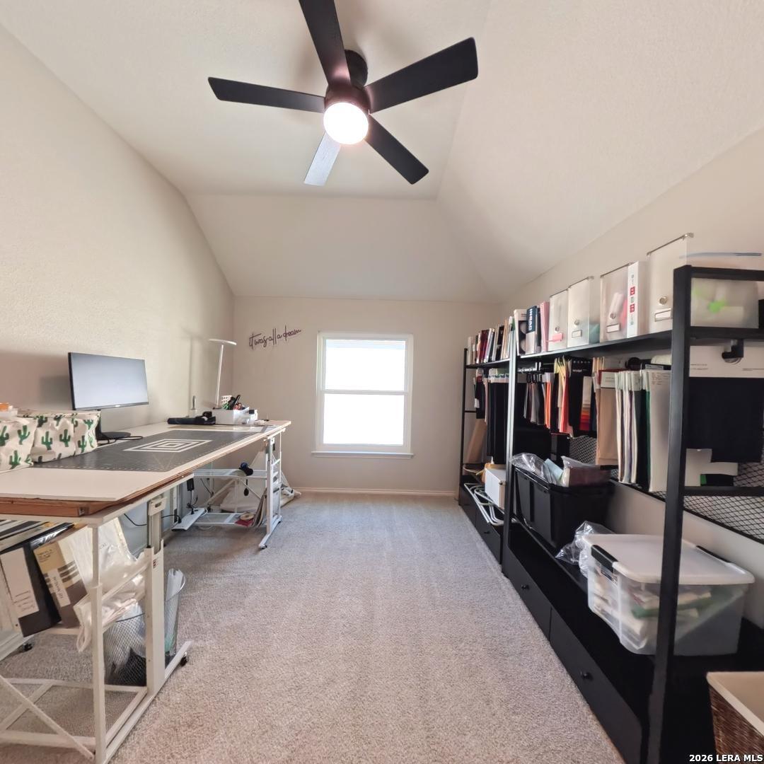 20115 Standish Road San Antonio, TX 78258 - Photo 36 of 51 a view of a livingroom with furniture hardwood floor and a ceiling fan