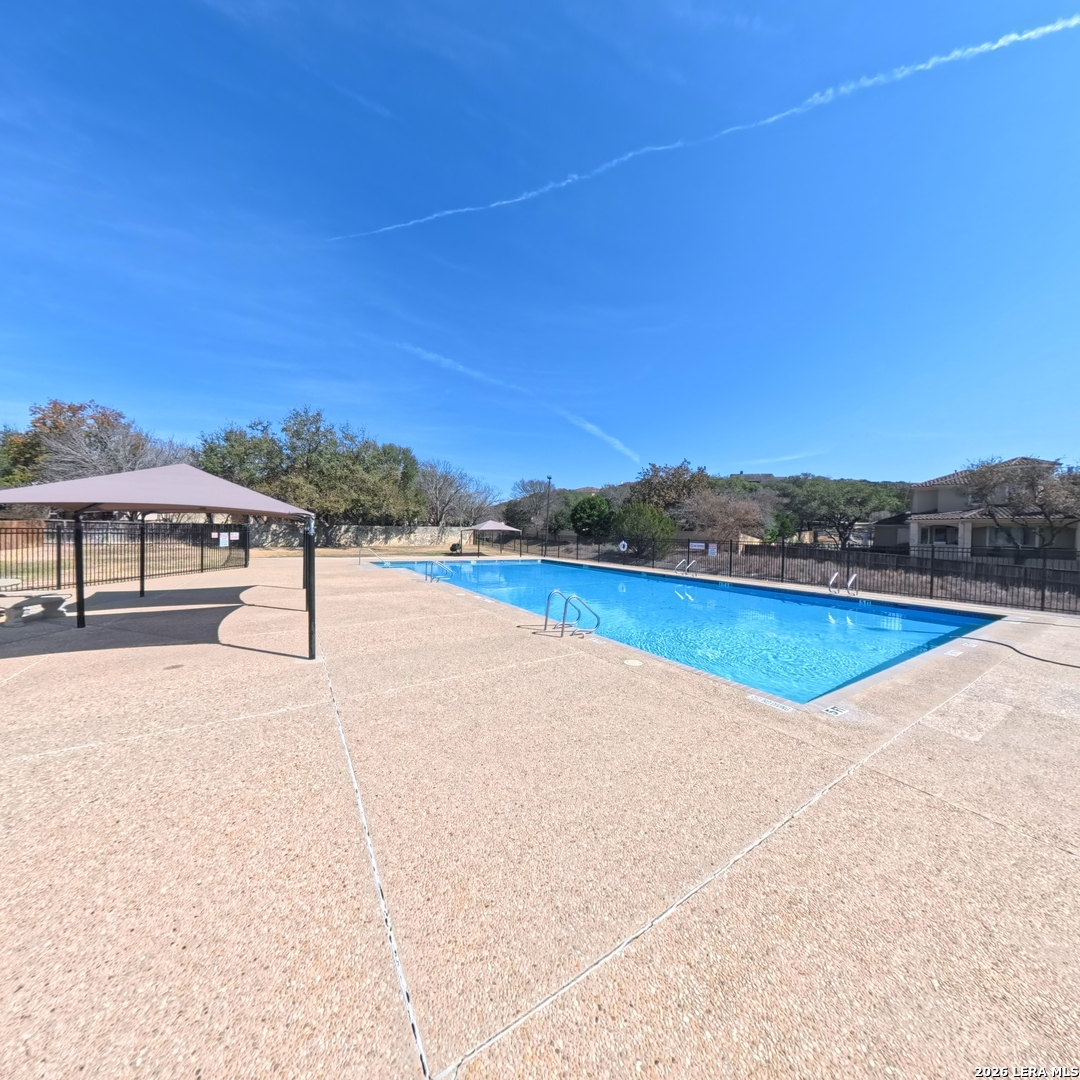 20115 Standish Road San Antonio, TX 78258 - Photo 50 of 51 a view of a swimming pool and an outdoor seating