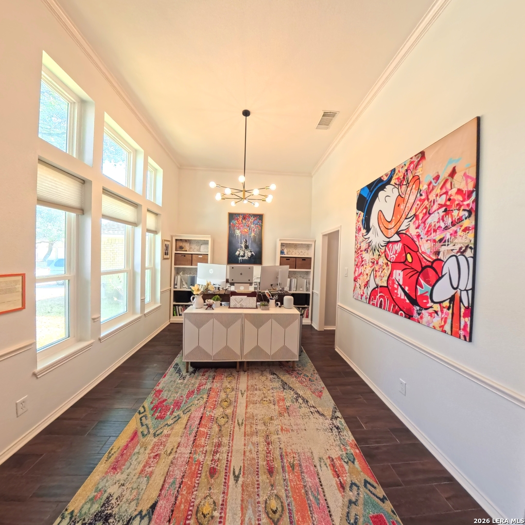 20115 Standish Road San Antonio, TX 78258 - Photo 5 of 51 a large living room with stainless steel appliances kitchen island granite countertop furniture a rug and a large window