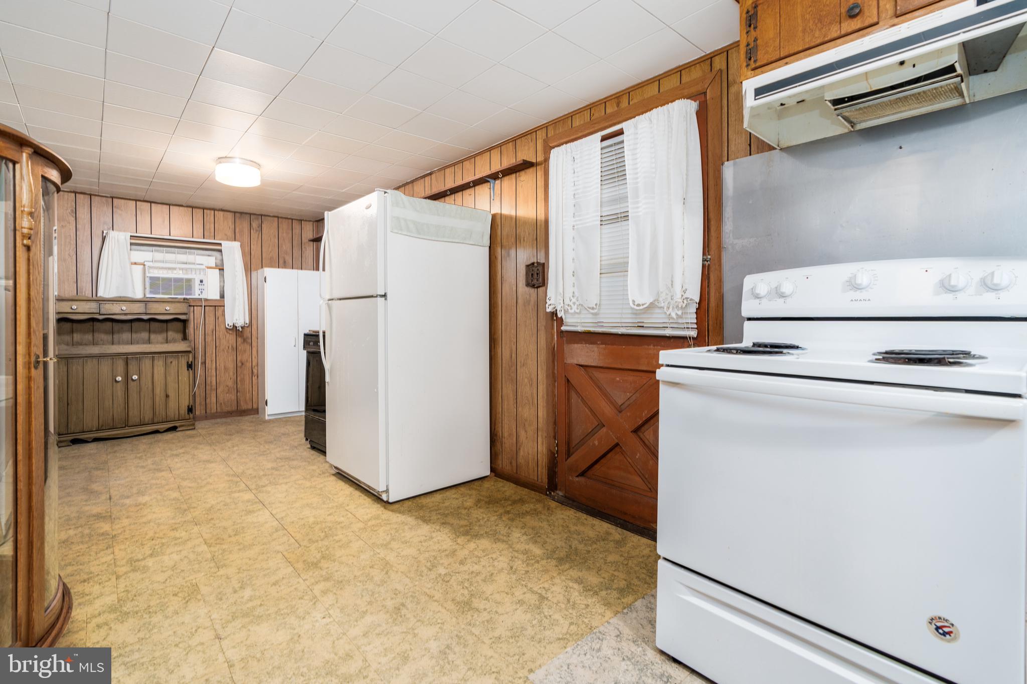 735 Ragan Road Conowingo, MD 21918 - Photo 7 of 15 Spacious kitchen with door to enclosed rear porch
