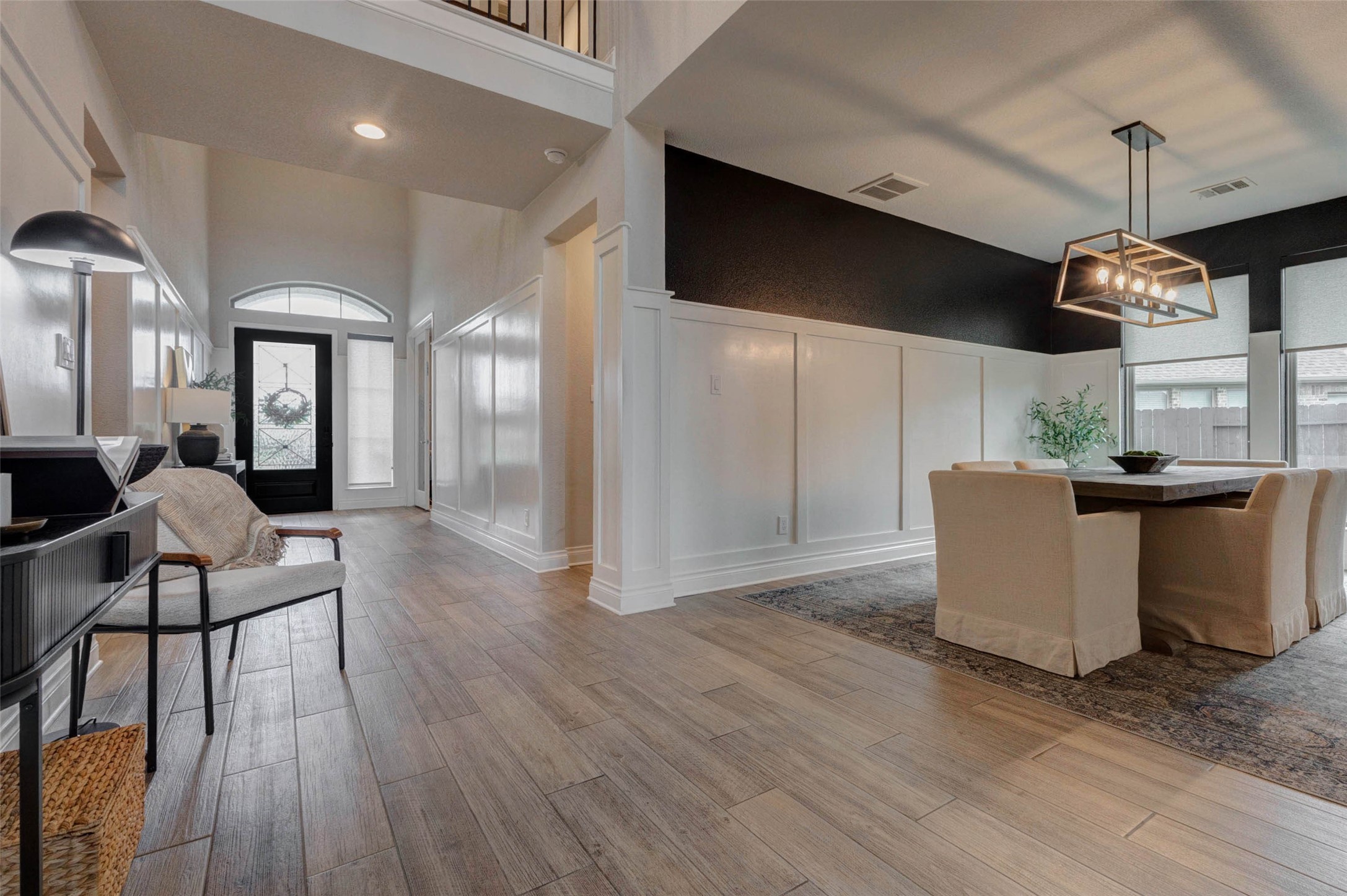 4303 Tupelo Leaf Court Manvel, TX 77578 - Photo 12 of 50 a view of a kitchen with furniture and wooden floor