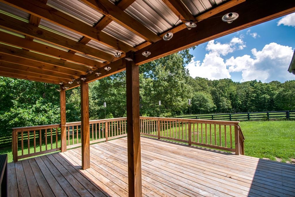 7155 Kingston Road Fairview, TN 37062 - Photo 3 of 6 a view of a balcony with wooden floor