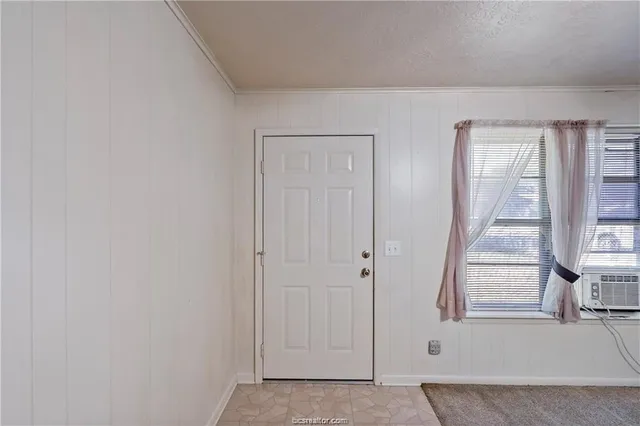 a view of an entryway with staircase