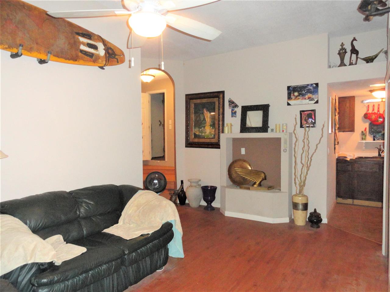 1340 Kings Estate Road St. Augustine, FL 32086 - Photo 13 of 40 a living room with furniture and a chandelier