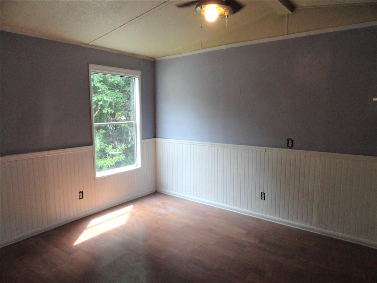 1340 Kings Estate Road St. Augustine, FL 32086 - Photo 32 of 40 an empty room with windows