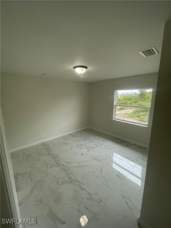 4524-4526 15th Street Southwest Lehigh Acres, FL 33973 - Photo 13 of 27 a view of an empty room and window