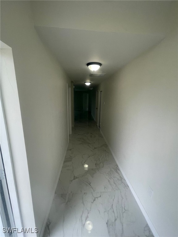 4524-4526 15th Street Southwest Lehigh Acres, FL 33973 - Photo 15 of 27 a view of a hallway