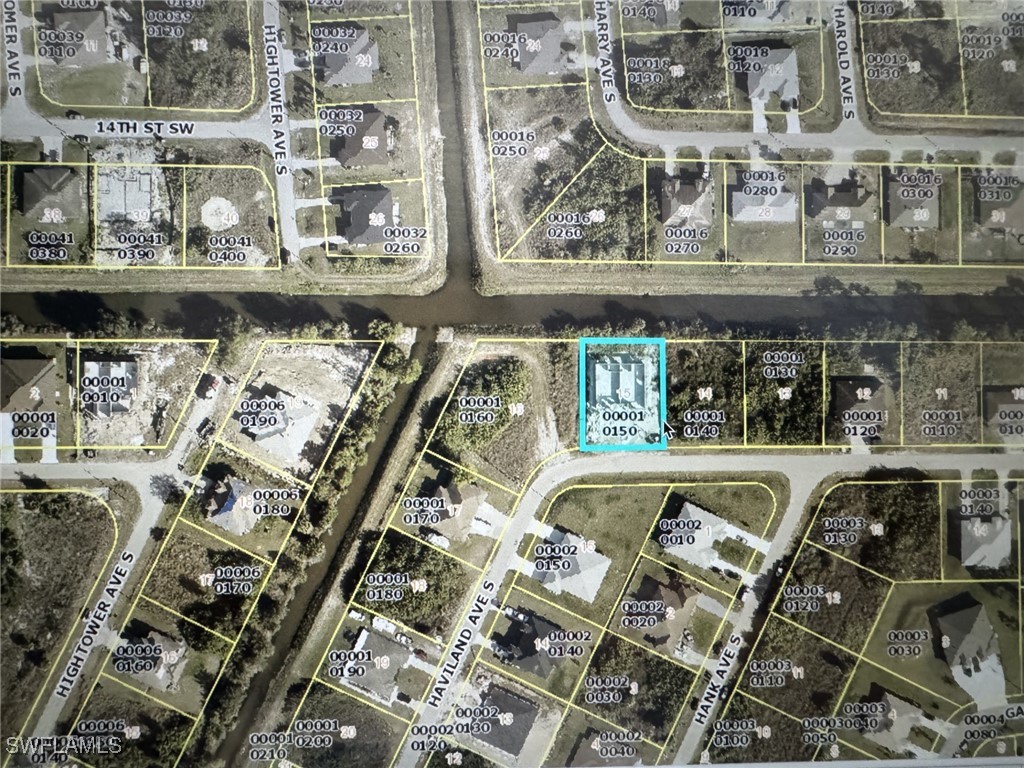 4524-4526 15th Street Southwest Lehigh Acres, FL 33973 - Photo 27 of 27 a view of a living room with a fireplace