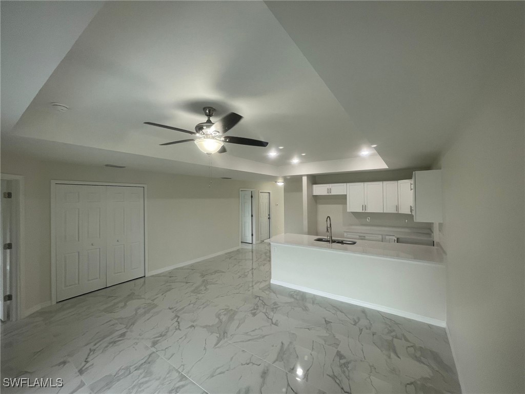 4524-4526 15th Street Southwest Lehigh Acres, FL 33973 - Photo 4 of 27 a view of a kitchen and a sink