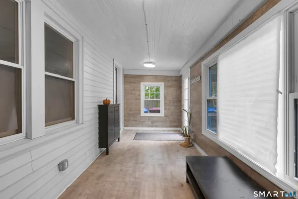 a view of a backyard with parked car