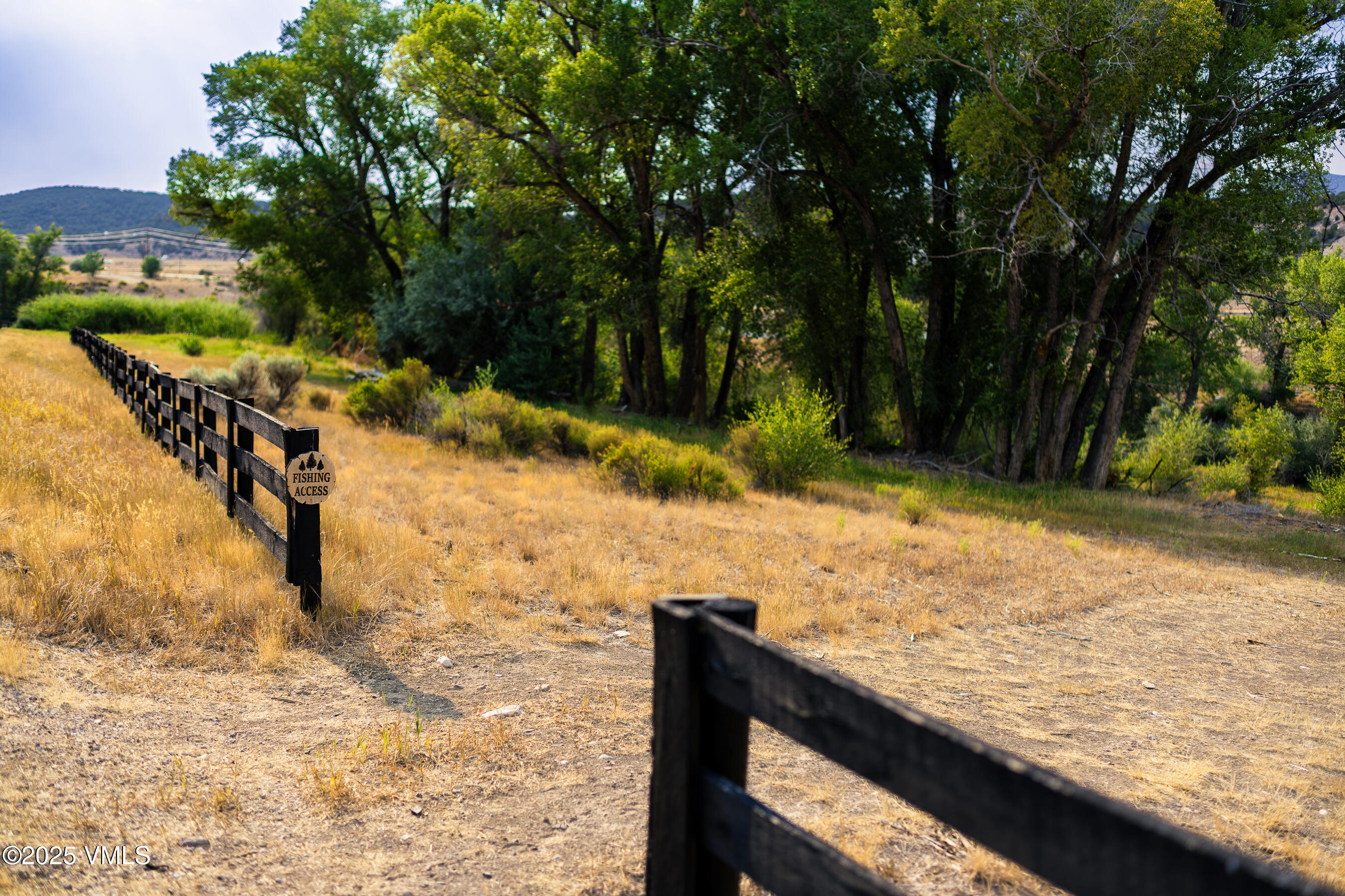 1633 West Diamond Star Road Eagle, CO 81631 - Photo 15 of 32 a view of a yard with wooden fence