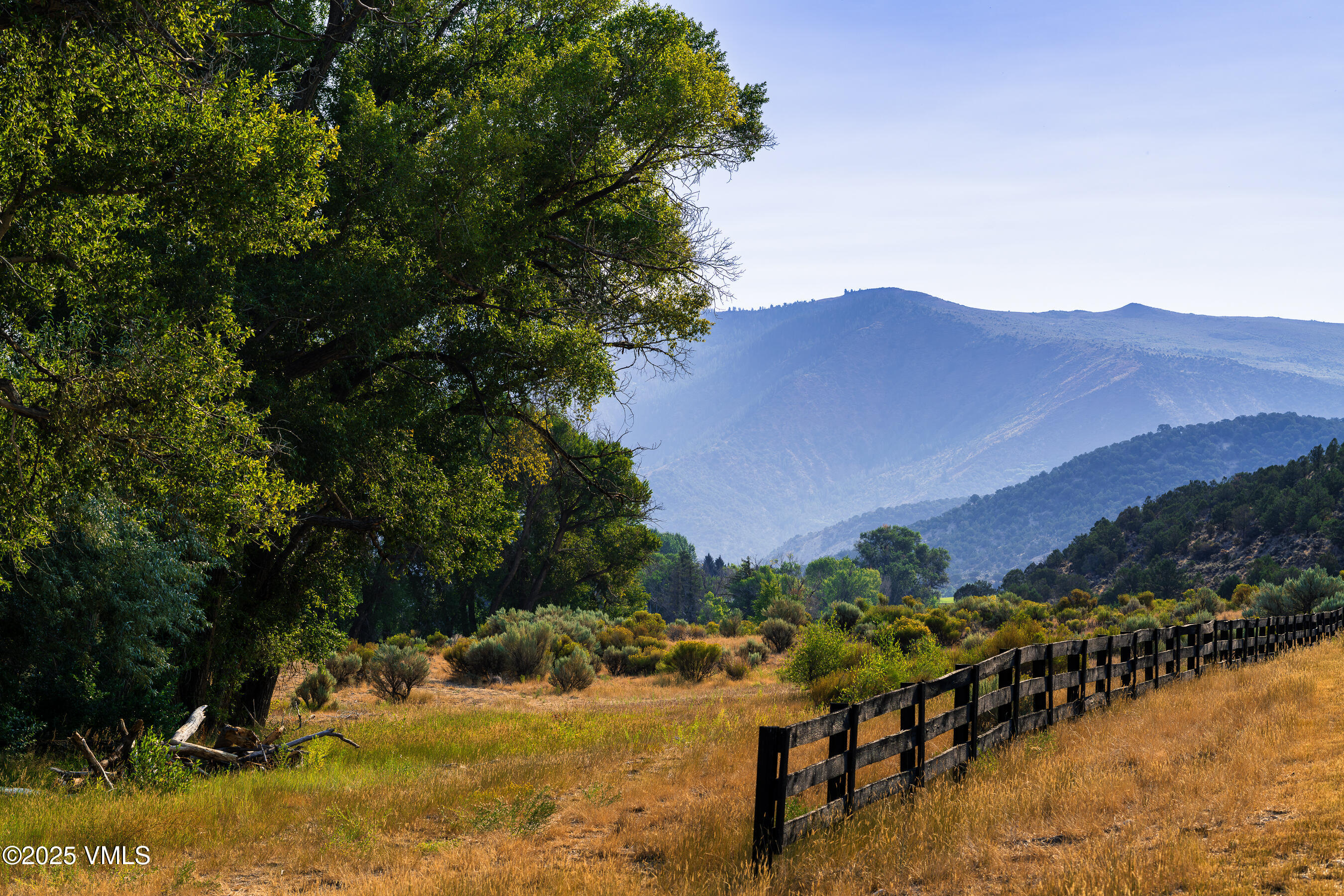 1633 West Diamond Star Road Eagle, CO 81631 - Photo 18 of 32 a view of a lake with a mountain in the background